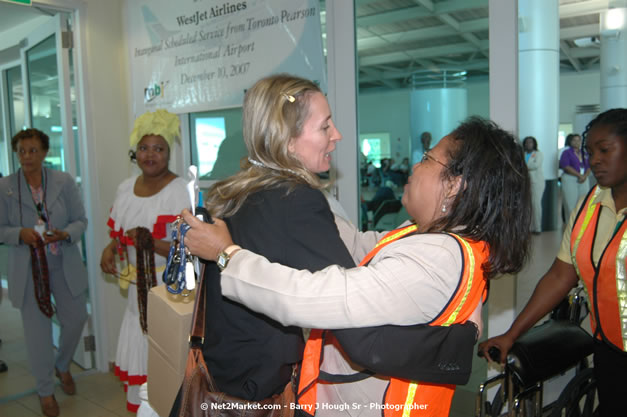 MBJ Airports Limited Welcomes WestJet Airlines - Inaugural Scheduled Service From Toronto Pearsons International Airport - Monday, December 10, 2007 - Sangster International Airport - MBJ Airports Limited, Montego Bay, Jamaica W.I. - Photographs by Net2Market.com - Barry J. Hough Sr, Photographer - Negril Travel Guide, Negril Jamaica WI - http://www.negriltravelguide.com - info@negriltravelguide.com...!