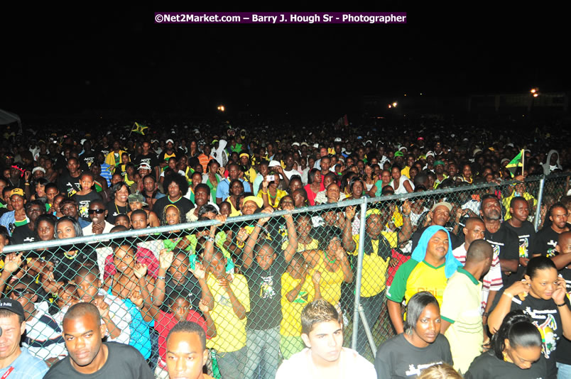 Usain Bolt of Jamaica - The Fastest Man In The World  - Usain Bolt Homecoming Celebrations Concert at the William Knibb High School Play Field, Trelawny - Ice, Ding Dong, Ravers Clavers, D'Angel, Voicemail, RDX and Dancers, Wayne Marshall, Tammi Chynn, Bugle, Nero, Tanya Stephens, Richie Spice, Kip Rich,and Shaggy - Photographs by Net2Market.com - Barry J. Hough Sr. Photojournalist/Photograper - Photographs taken with a Nikon D300 - Negril Travel Guide, Negril Jamaica WI - http://www.negriltravelguide.com - info@negriltravelguide.com...!