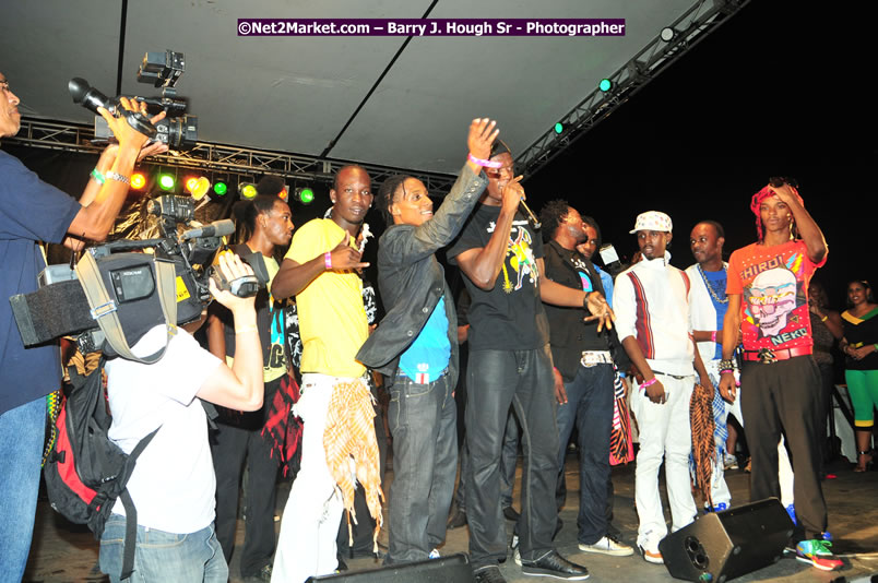 Usain Bolt of Jamaica - The Fastest Man In The World  - Usain Bolt Homecoming Celebrations Concert at the William Knibb High School Play Field, Trelawny - Ice, Ding Dong, Ravers Clavers, D'Angel, Voicemail, RDX and Dancers, Wayne Marshall, Tammi Chynn, Bugle, Nero, Tanya Stephens, Richie Spice, Kip Rich,and Shaggy - Photographs by Net2Market.com - Barry J. Hough Sr. Photojournalist/Photograper - Photographs taken with a Nikon D300 - Negril Travel Guide, Negril Jamaica WI - http://www.negriltravelguide.com - info@negriltravelguide.com...!