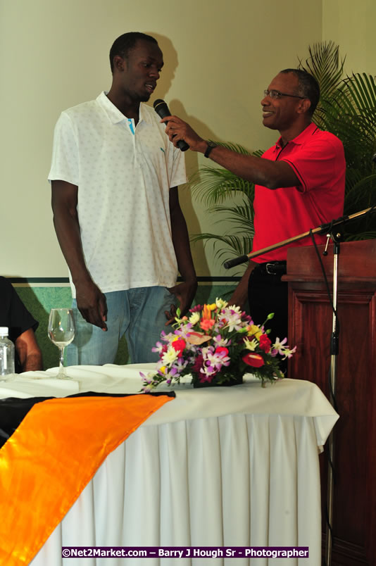 Usain Bolt of Jamaica - The Fastest Man In The World  - Usain Bolt Homecoming Celebrations - Press Conference at the Grand Bahia Principe &amp; Sherwood Content - Waldensia Primary School - Photographs by Net2Market.com - Barry J. Hough Sr. Photojournalist/Photograper - Photographs taken with a Nikon D300 - Negril Travel Guide, Negril Jamaica WI - http://www.negriltravelguide.com - info@negriltravelguide.com...!