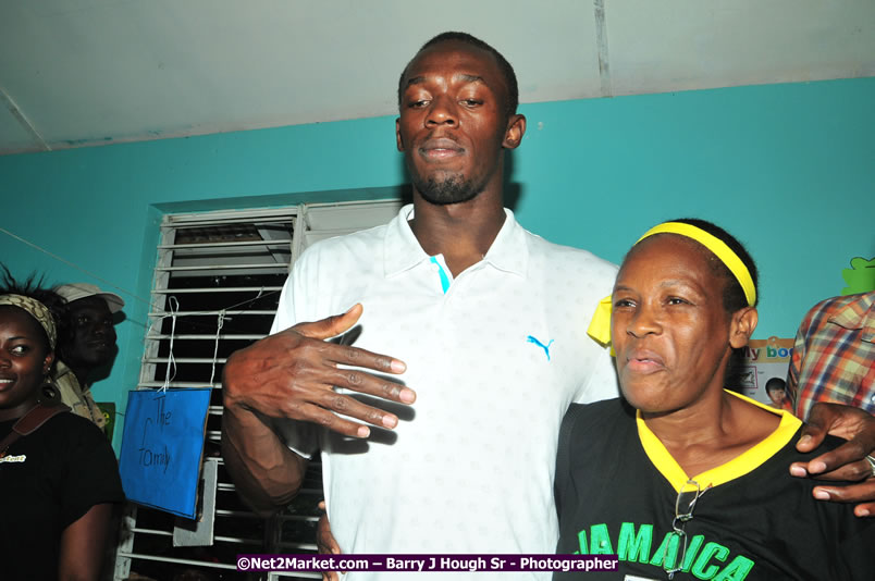 Usain Bolt of Jamaica - The Fastest Man In The World  - Usain Bolt Homecoming Celebrations - Press Conference at the Grand Bahia Principe &amp; Sherwood Content - Waldensia Primary School - Photographs by Net2Market.com - Barry J. Hough Sr. Photojournalist/Photograper - Photographs taken with a Nikon D300 - Negril Travel Guide, Negril Jamaica WI - http://www.negriltravelguide.com - info@negriltravelguide.com...!