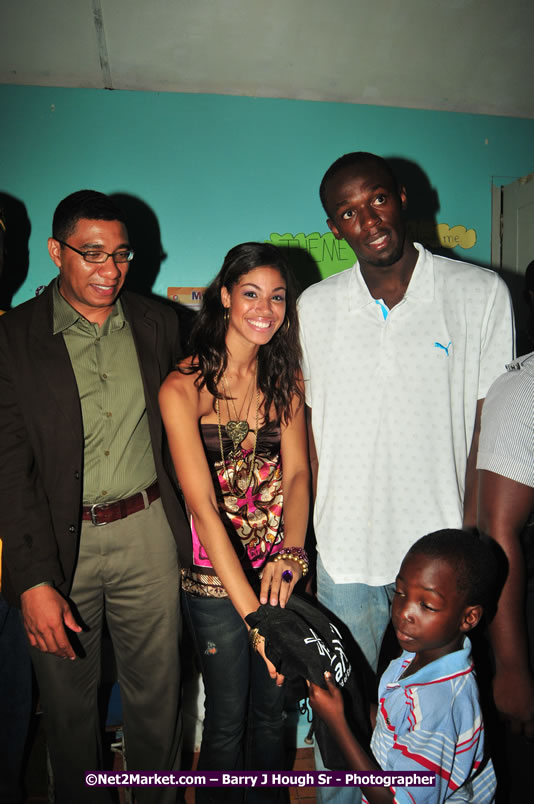 Usain Bolt of Jamaica - The Fastest Man In The World  - Usain Bolt Homecoming Celebrations - Press Conference at the Grand Bahia Principe &amp; Sherwood Content - Waldensia Primary School - Photographs by Net2Market.com - Barry J. Hough Sr. Photojournalist/Photograper - Photographs taken with a Nikon D300 - Negril Travel Guide, Negril Jamaica WI - http://www.negriltravelguide.com - info@negriltravelguide.com...!